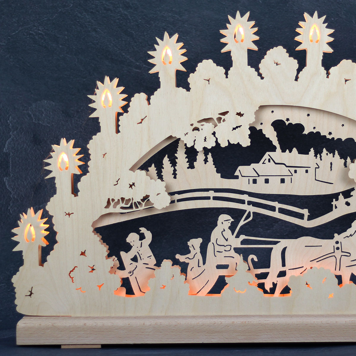 Erzgebirgs-Schwibbogen 'Schlittenfahrt' 3D 16 flammig (LED Optional) 66x6x44cm